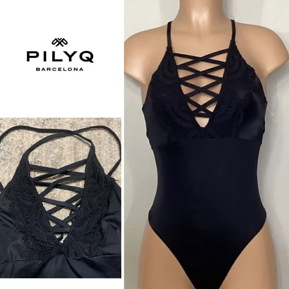 New. Pilyq LACE front with black lace trim swimsuit. Run small
